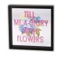 Preview: Love Frames Glasbild "Tell Me A Story With Flowers" mit blauer Hortensie und pinkem Schriftzug, schwarzer MDF-Rahmen – florale Wanddekoration